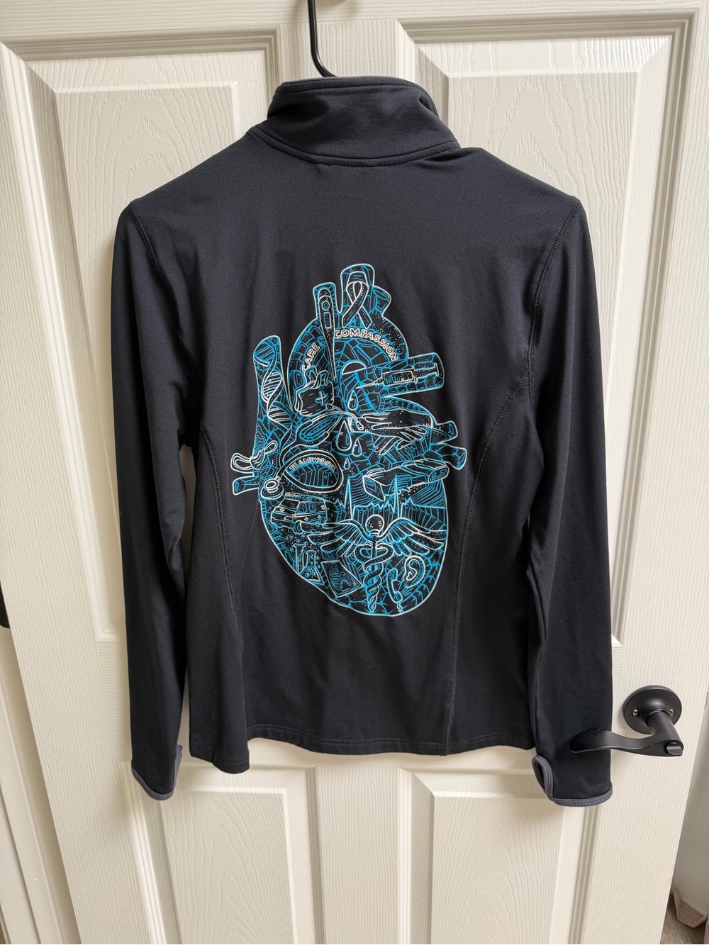 Women’s Black Zip-Front Jacket with Teal Heart Graphic